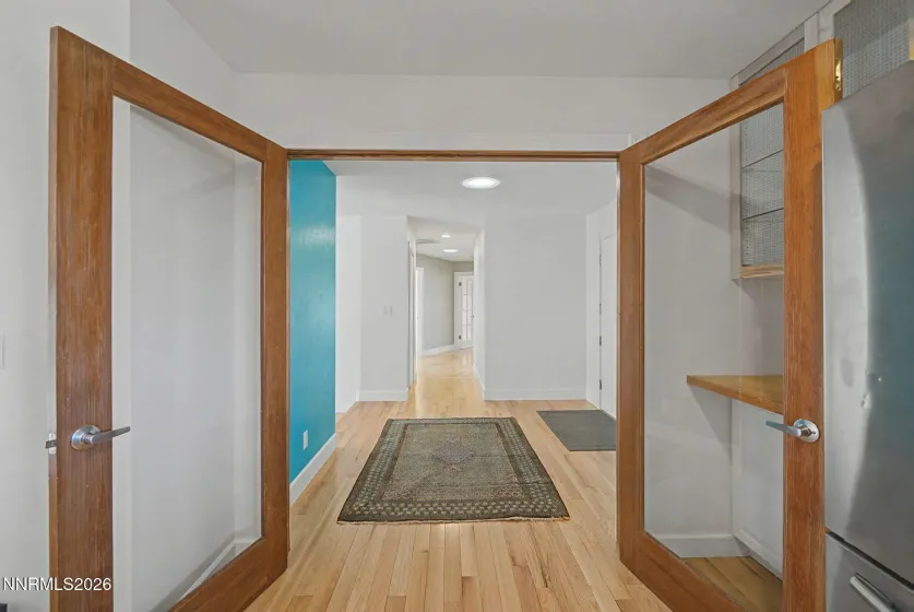 Towards Entry From Kitchen to Hallway with Bedrooms