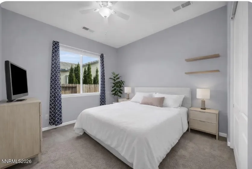 Virtually staged bedroom number one