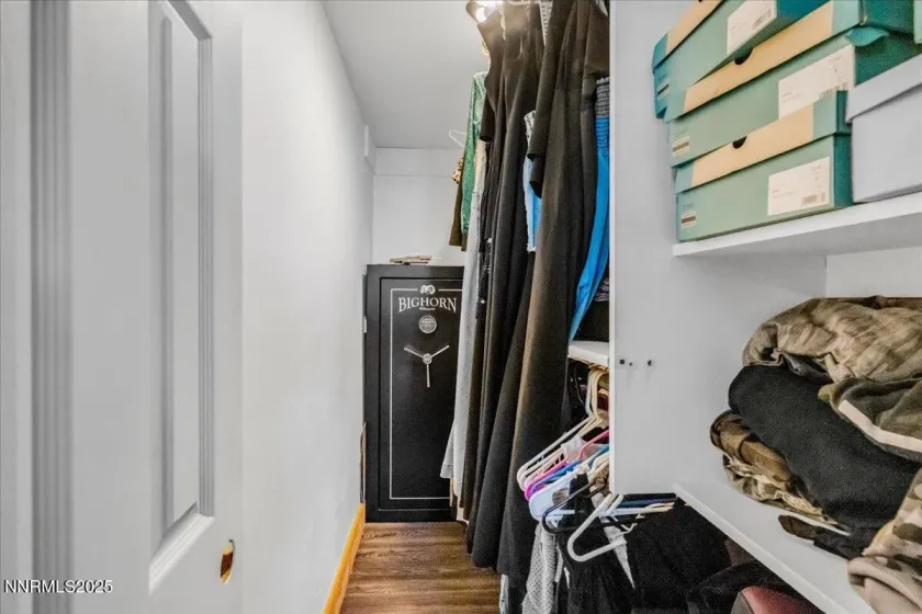 walk in closet in primary bedroom