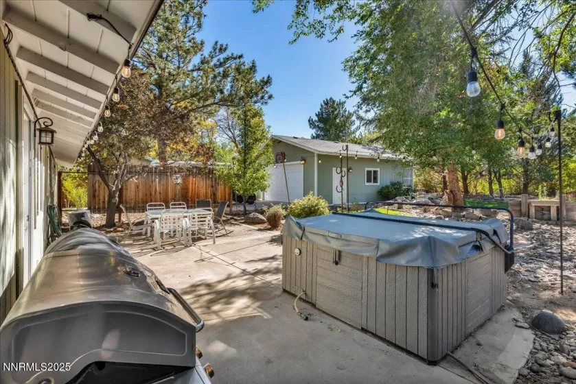 outdoor space from kitchen with hot tub