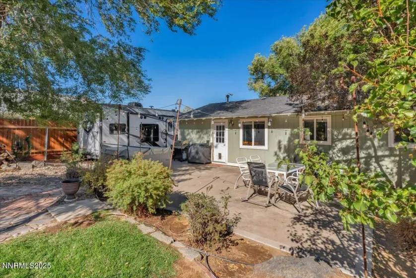 outdoor space with RV parking & fully landscaped