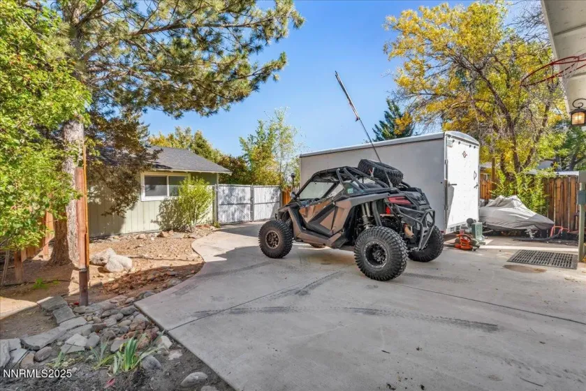 parking pad and fully fenced in the backyard.