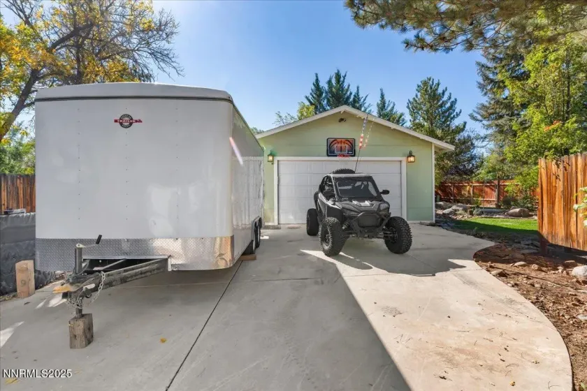 parking pad and detached 2 car garage or shop.