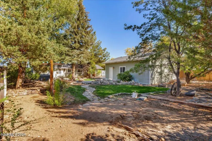 fully landscaped with fruit trees, garden boxes and irrigation.