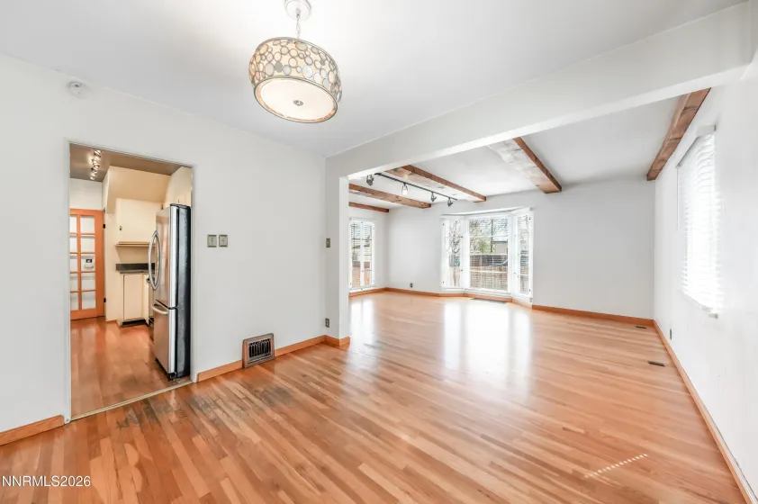 Dining room looking into Living and Kitchen areas