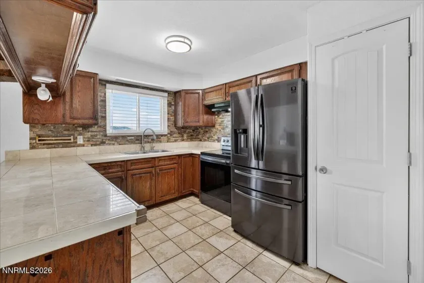 7730 Tamra, Reno, Nevada 89506, 4 Bedrooms Bedrooms, ,3 BathroomsBathrooms,Residential,Residential,Tamra,260004271