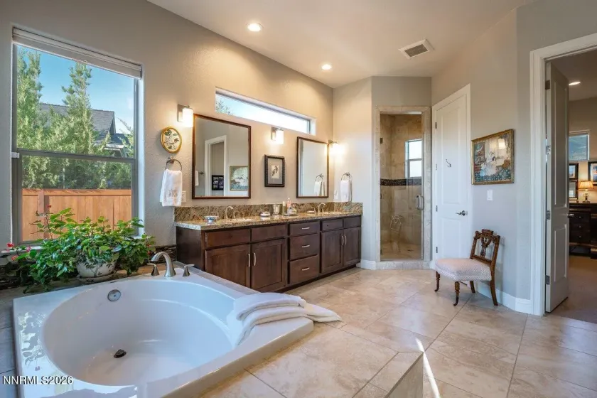 So much storage.. This primary suite is enhanced with a built in walk in closet