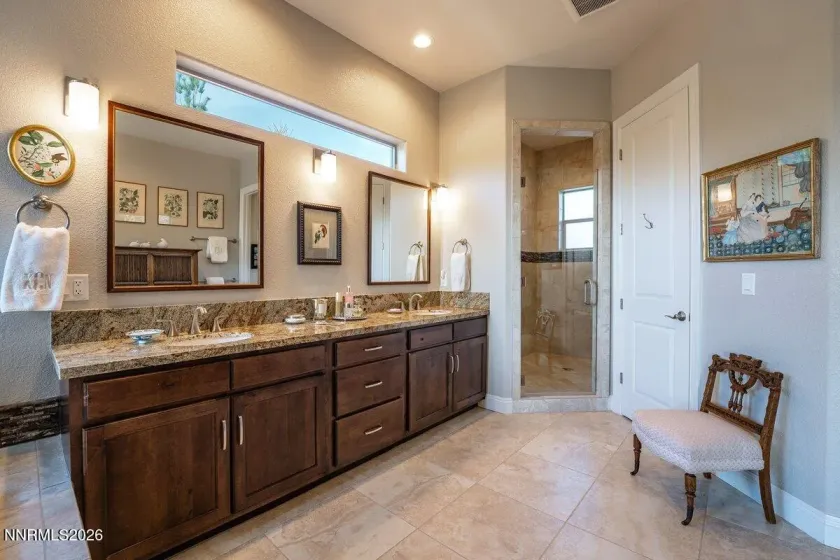 There is a lovely linen closet conveniently located in the primary suite bath.