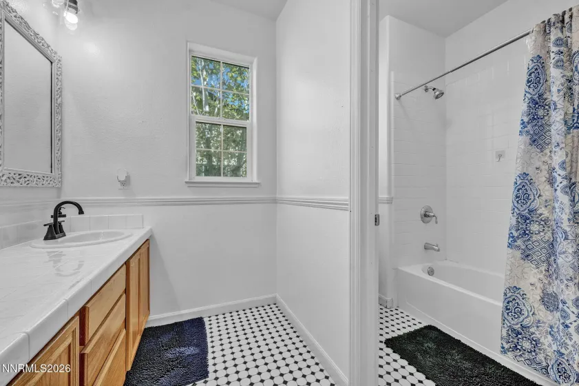 Separate bath and toilet area for additional privacy.