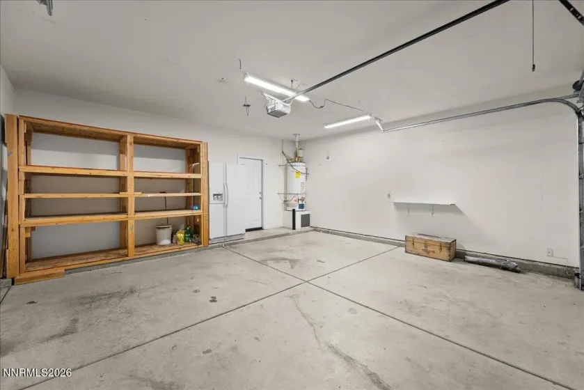 Two car garage with shelving