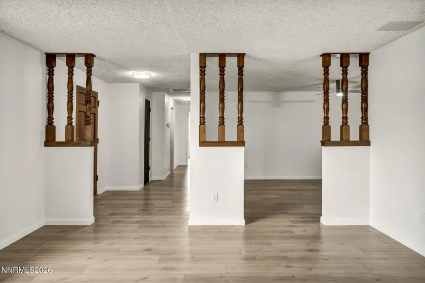 Living Room View into Entry, Dining and Hallway