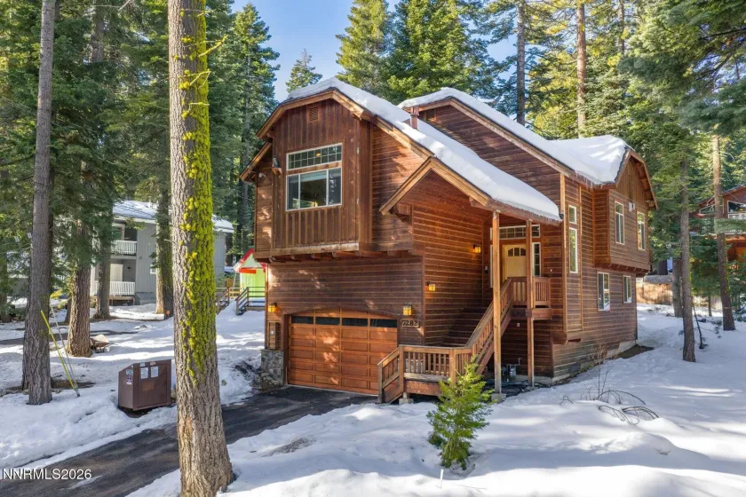 Charming exterior showcasing rustic mountain architecture and natural surroundings.