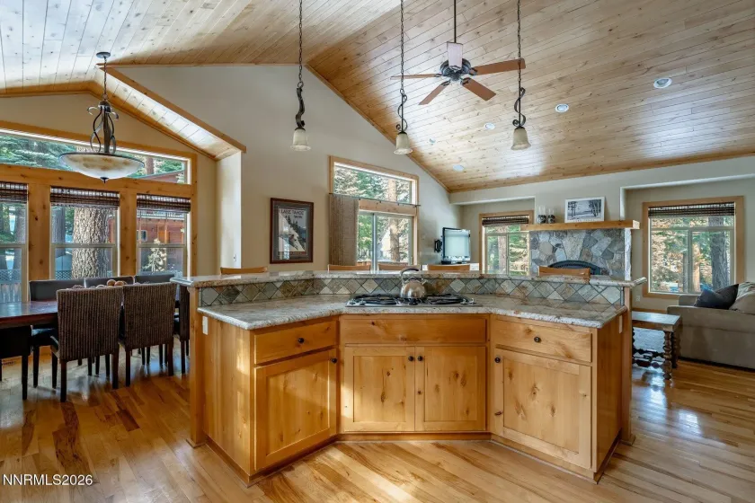 Well-appointed kitchen with large island, custom cabinetry, and seamless flow to the great room.