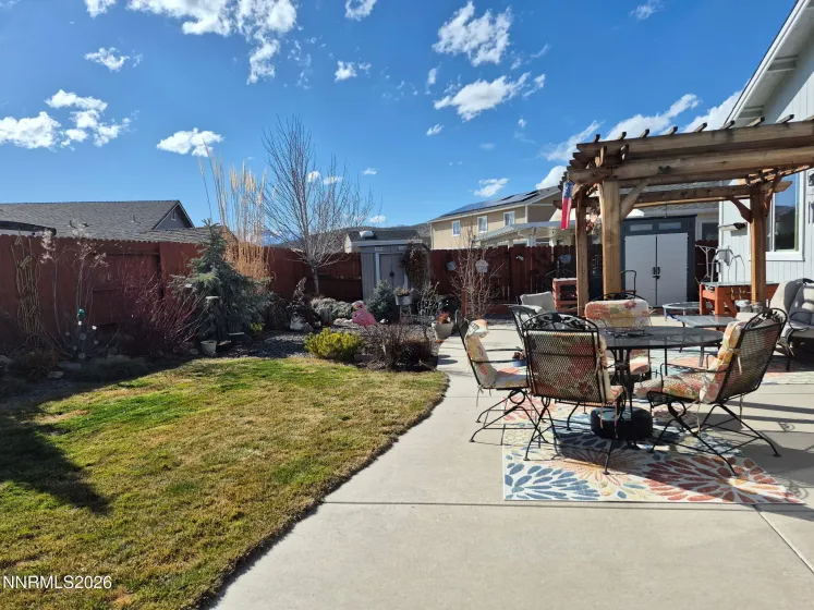 Backyard patio with pergola