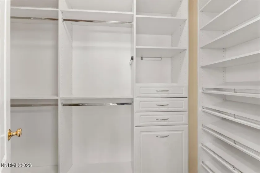 Custom Built-in Primary walk-in closet.