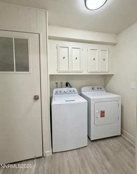 Laundry room with cabinets