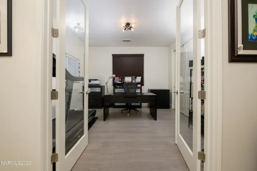 Bedroom 1 w/ shared bathroom and french doors