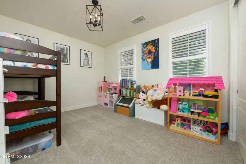 Bedroom 2 w/ shared bathroom to Bedroom 1