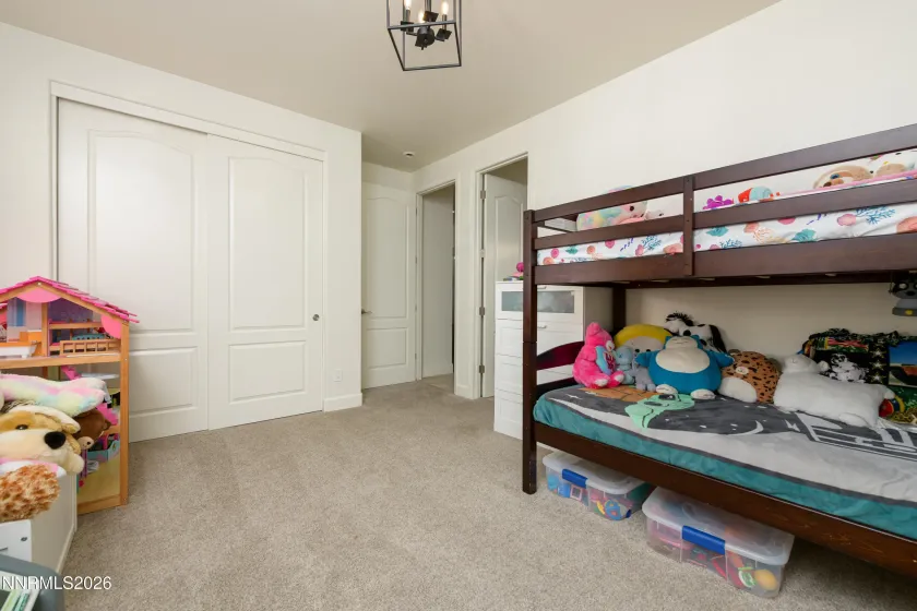 Bedroom 2 w/ shared bathroom to Bedroom 1