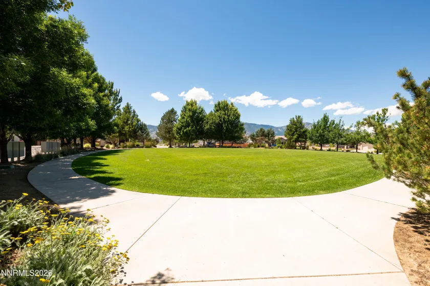 Park across the street with walking path. Dogs allowed