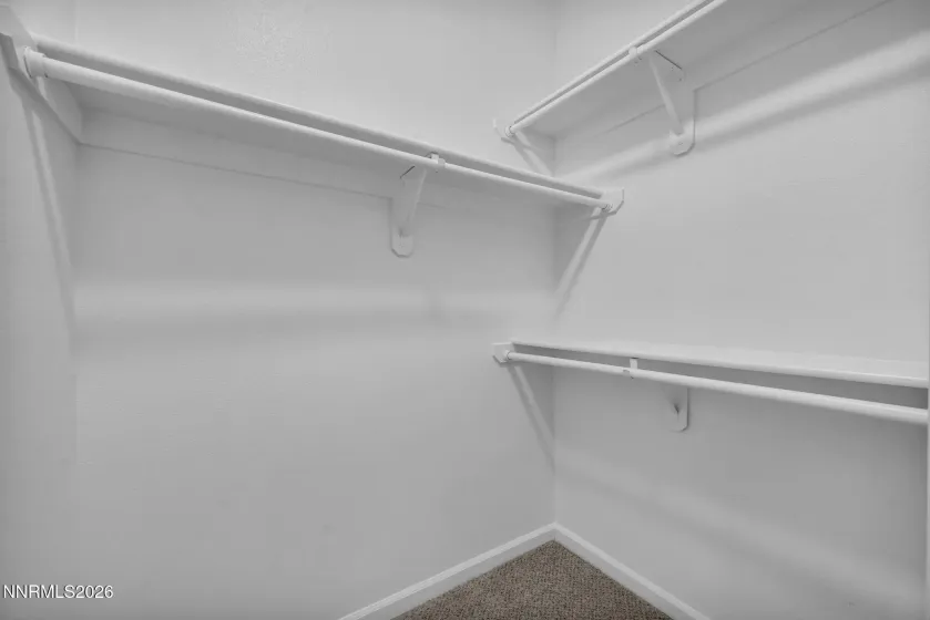 Secondary Bedroom Walk-In Closet – Convenient walk-in closet located off the secondary bedroom, providing generous storage space and organization options.