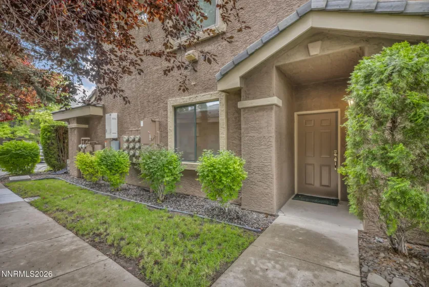 Front Exterior View – Alternate side view of the condo’s front exterior, highlighting the architecture and attractive curb appeal.