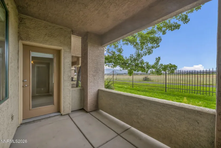Primary Bedroom Patio Access – Convenient access from the primary bedroom to the covered patio, creating a seamless connection to the outdoor living space.