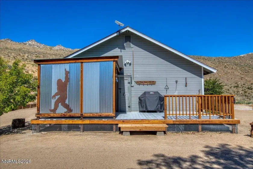 Deck adjacent to primary bedroom
