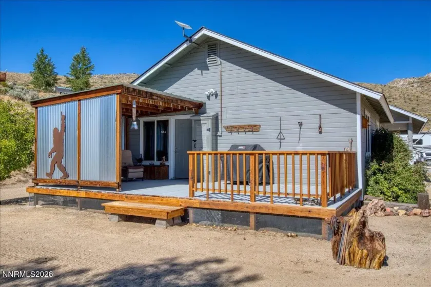 Deck adjacent to primary bedroom