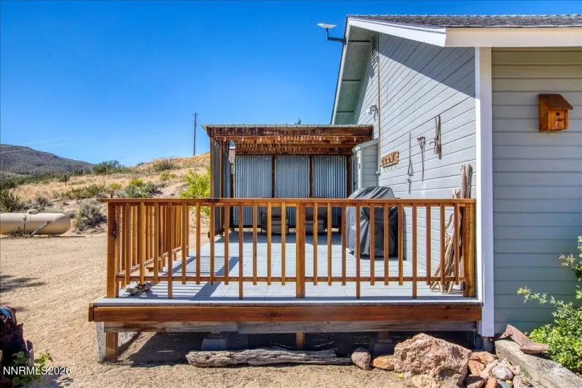 Deck adjacent to primary bedroom