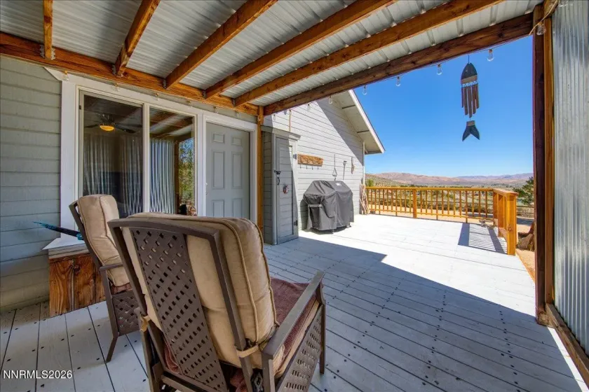 Deck adjacent to primary bedroom