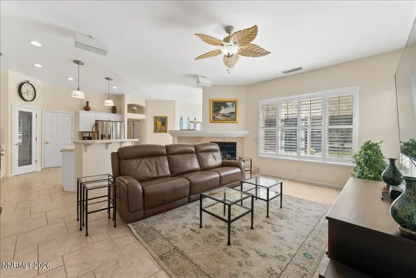 Open concept family room to kitchen with