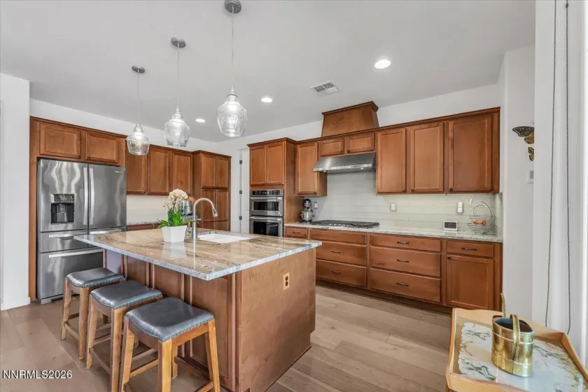 Extended center island with cabinets below.
