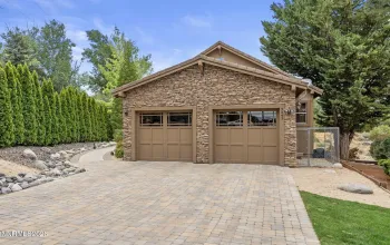 Street View, two car garage and dog run.