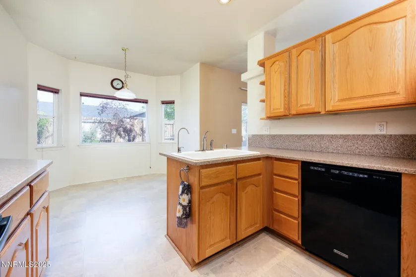 Kitchen with breakfast bar and nook