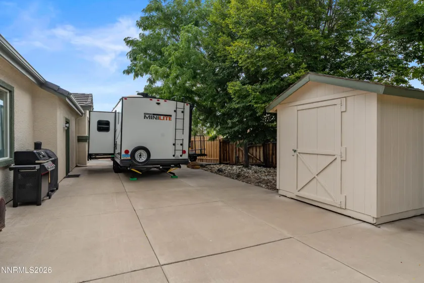 Rear View of RV parking with Shed