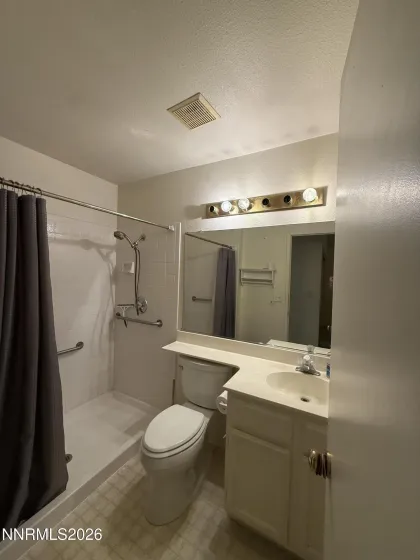 Primary bathroom with walk-in shower
