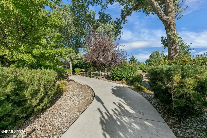 Nearby paved walking paths offer convenient access to scenic outdoor strolls and leisurely recreation.