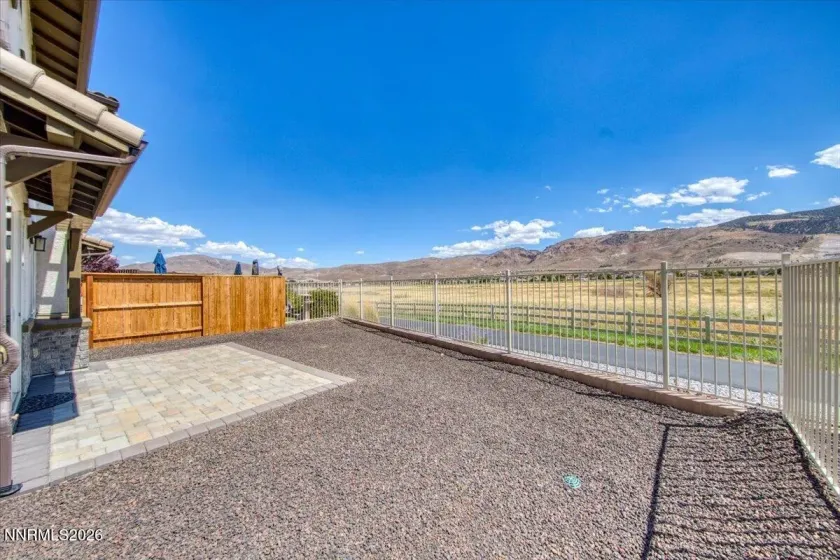 Backyard facing trail and meadow