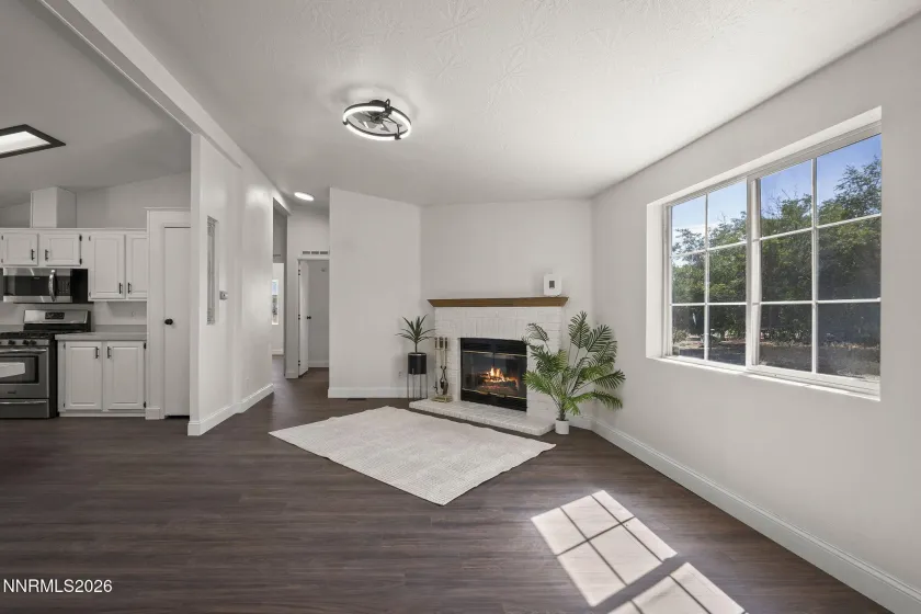 Fireplace in Family Room-Fire in fireplace is virtual image