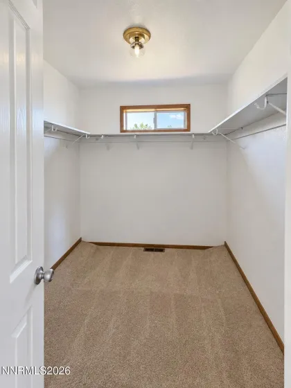 Walk-in closet, primary bedroom