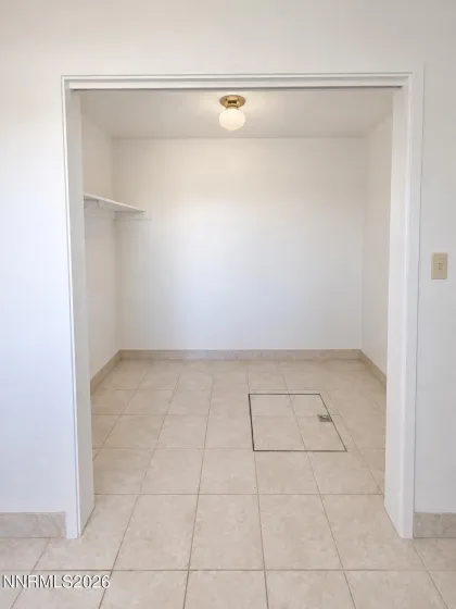 Part of the fourth bedroom