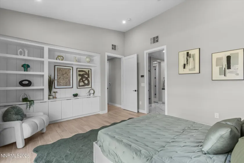 Primary suite, door to hall, door to bathroom.