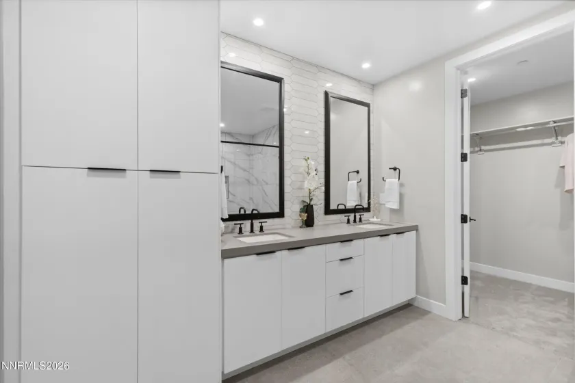 Dual primary bathroom, walk-in closet.