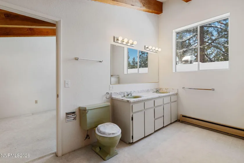 Top floor jack and jill bathroom between both bedrooms.