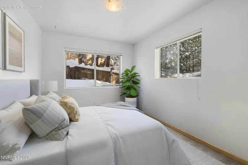Virtually staged top floor bedroom.