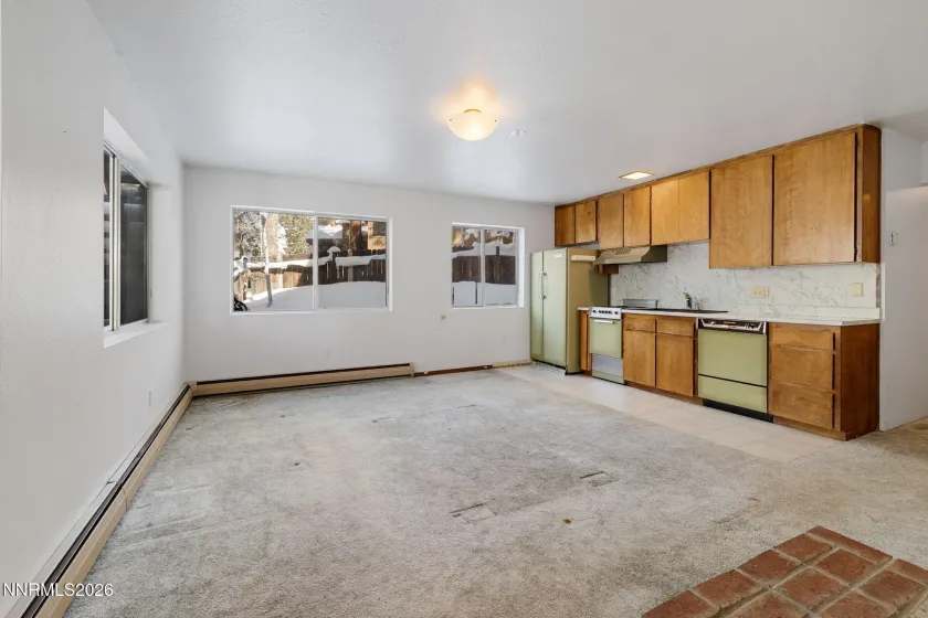 Downstairs living area with kitchenette.