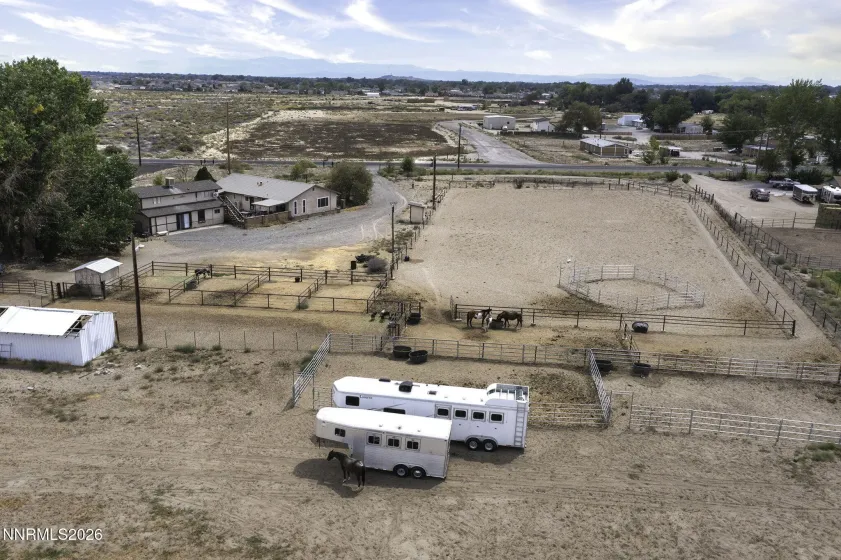 137x273 roping arena next to house in front