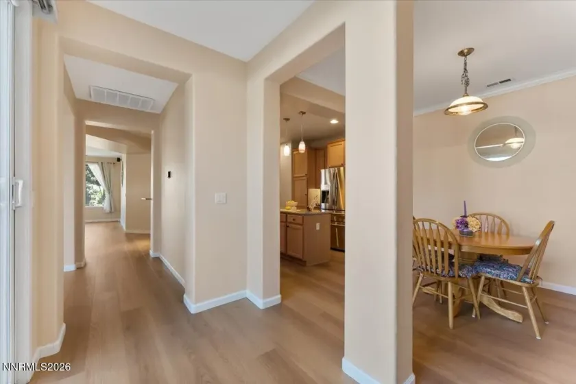 Kitchen nook adjoins the sliding door to the atrium