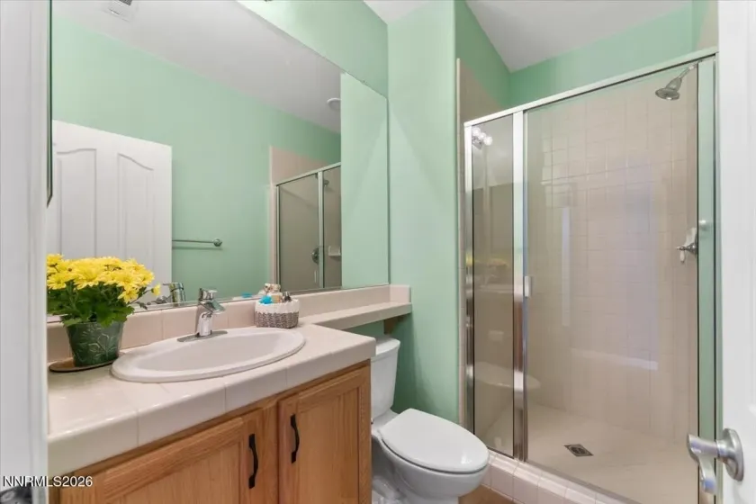 Full guest bath at the front of the home